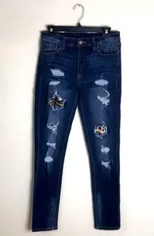 KanCan ladies distressed dark wash denim jeans with leopard patches on areas 29