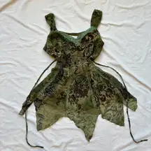 Green and black fairy tank top with floral lace, snakes skin print, animal print, swirls, sheer overlay, adjustable bodice, and asymmetrical fairy hem