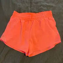 Women's coral colored active shorts