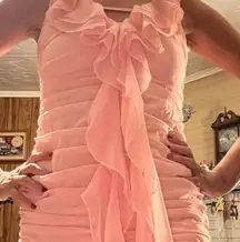 Pink,silk party dress with lots of frills. Size small. Never worn. Barbiecore