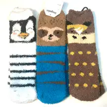 Set of 3 fuzzy socks featuring a penguin, raccoon, and sloth design animal print socks 