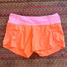 LULULEMON PINK & ORANGE SPEED SHORTS