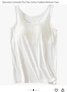 Crafted for comfort and simplicity, this white women's vest camisole is a versatile addition to your wardrobe. The built-in shelf bra offers a subtle lift, while the modal material provides a breathable and soft touch, ideal for the warm summer months. Its sleeveless design and round neckline complement the casual yet chic look, perfect for any holiday or laid-back occasion.  The tank top features a pullover closure for easy wear and is machine washable for hassle-free maintenance. The wide strap ensures a comfortable fit, and its solid pattern allows for effortless pairing with your favorite jeans or skirt. This basic, regular-fit vest is a staple for those who value both style and comfort.