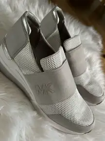Michael kors silver sneaker size 9.5 slip on