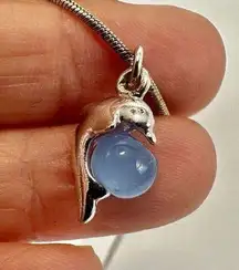 Silver tone blue cats eye dolphin pendant necklace