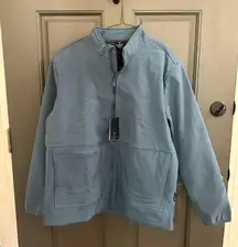 Dusty blue men’s sip up golf jacket 