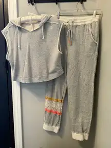 Free People grey sweatsuit set with unique pattern  on leg.