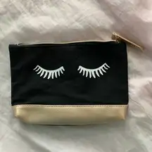 black and gold Ipsy makeup bag