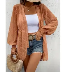  Solid  Jacquard Cool Ruffle Trim Lantern Sleeve Cardigan Shirred Woven Size Xl  100% Polyester  The Solid Jacquard Cool Ruffle Trim Lantern Sleeve Cardigan is a stylish and trendy addition to any woman's wardrobe. The shirred woven design in a size XL offers a flattering fit and a touch of sophistication. The ruffle accents add a playful and feminine touch to this versatile cardigan, making it perfect for any casual or dressy occasion. The lantern sleeves add a unique and fashionable element to the overall look, making this cardigan a must-have for any fashion-forward woman.