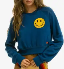 Aviator Nation x SoulCycle cropped crew sweatshirt Medium Blue smiley graphic