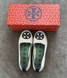 Tory Burch slip on sneakers. Color/ ivory and navy. Box included. Size 7