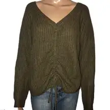 a. Peach v neck drawstring scrunch sweater