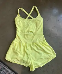 Free people movement highlighter yellow righteous runs romper Xs