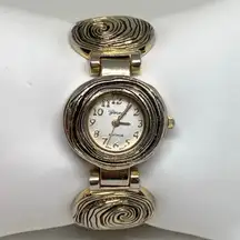 Geneva platinum women’s quartz analog watch 28mm gold tone cuff bracelet running