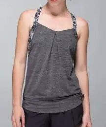 Lululemon Rest Less Tank in Heathered Black and Flowabunga Black Angel Wing.