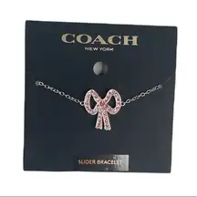 Coach Antique Pave Bow Slider Bracelet, Gold Tone, Pink