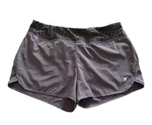 Gray athletic shorts, attached underpants, shorts have been cleaned and sanitized, black and gray cheetah print Along waistband, excellent condition, size small, waistband is 15 inches side to side