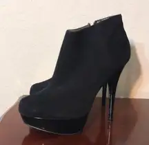 Black high heeled boots