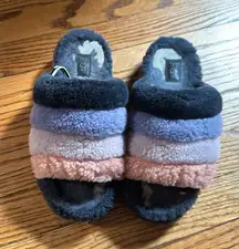 Furry Ugg slippers with strap in the back