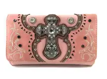 Introducing the Vintage Cross Western Crossbody Wallet! Made from high-quality material, this wallet features a trendy crossbody design and vintage cross detailing. Keep your essentials organized and add a touch of Western flair to any outfit. Perfect for those who like to stand out from the crowd (in a good way)!