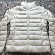 Uniqlo women's cream light down puffer