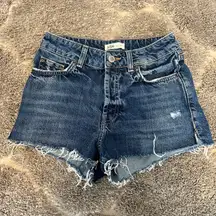 distressed mid rise denim shorts