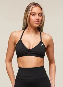 gymshark minimal sports bra M low cut open strappy back light support black
