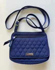 Vera Bradley navy mini cross body purse  Flap Magnet Closure