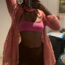 Handmade crochet pink cardigan with button detail