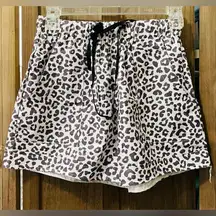 EUC Coeur de Vague comfy summer leopard shorts with drawstring and pockets.