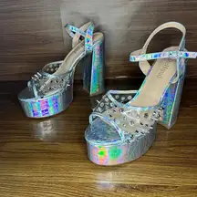 Holographic metallic chunky heeled sandals
Women’s 9.5
