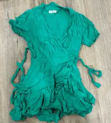 Vestique small green ruffled romper. Ties on side