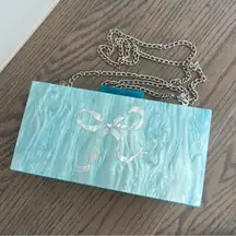 Anthropologie x Rae Of Light Acrylic Bow Clutch Box Bag in Blue and White