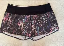 Lululemon  Run Times Short 4-way
Stretch Floral Sport Black Purple Multi
Size 8