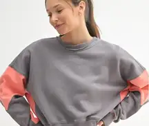 Mono B cropped sweatshirt. Grey and coral color block