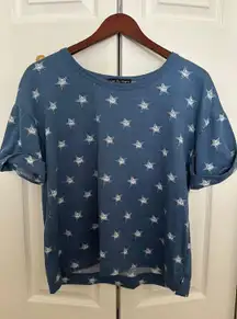 blue shirt with stars