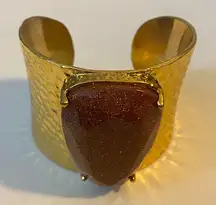 Park Lane Dubai gold tone cuff bracelet with burgundy stone