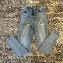 American Eagle Curvy Super Hi-Rise Jegging Light Washed Ripped Jeans