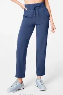 NWT Spanx “On the Move Slim Pant” in faded indigo (navy) size M
