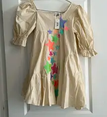 Queen of Sparkles. NWT size XS tan star dress.