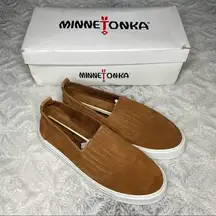 Minnetonka Women's Gabi Suede Round Toe Slip-Ons in Brown