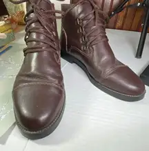 Chilis woman’s brown leather booties size 7 lace front.