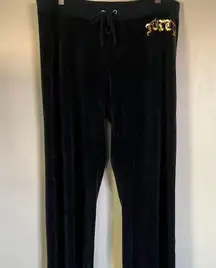 Juicy Couture navy trackpants with "juicy" detail