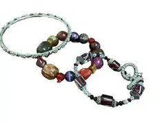 Set of three bracelets, red, pink, purple silver