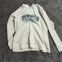 Cabela's Teal and Cream Apparel