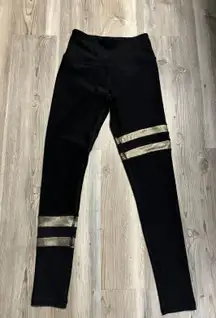 G By  Size XS Black Leggings with gold inseam is 25