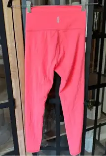 FP movement leggings coral neon pink orange high waisted petal pusher good karma