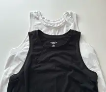 Set of 2 Old Navy activewear tank tops. Color- 1 white 1- black.Size- both small