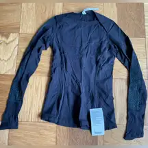 NWT Kanto Catch Me black Rulu long sleeve top size 4 reflective