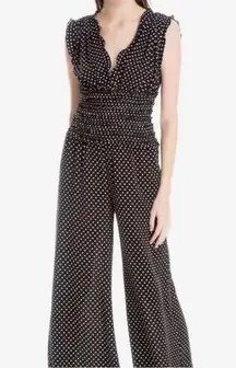 Polka dot ruffled black and white jump suit